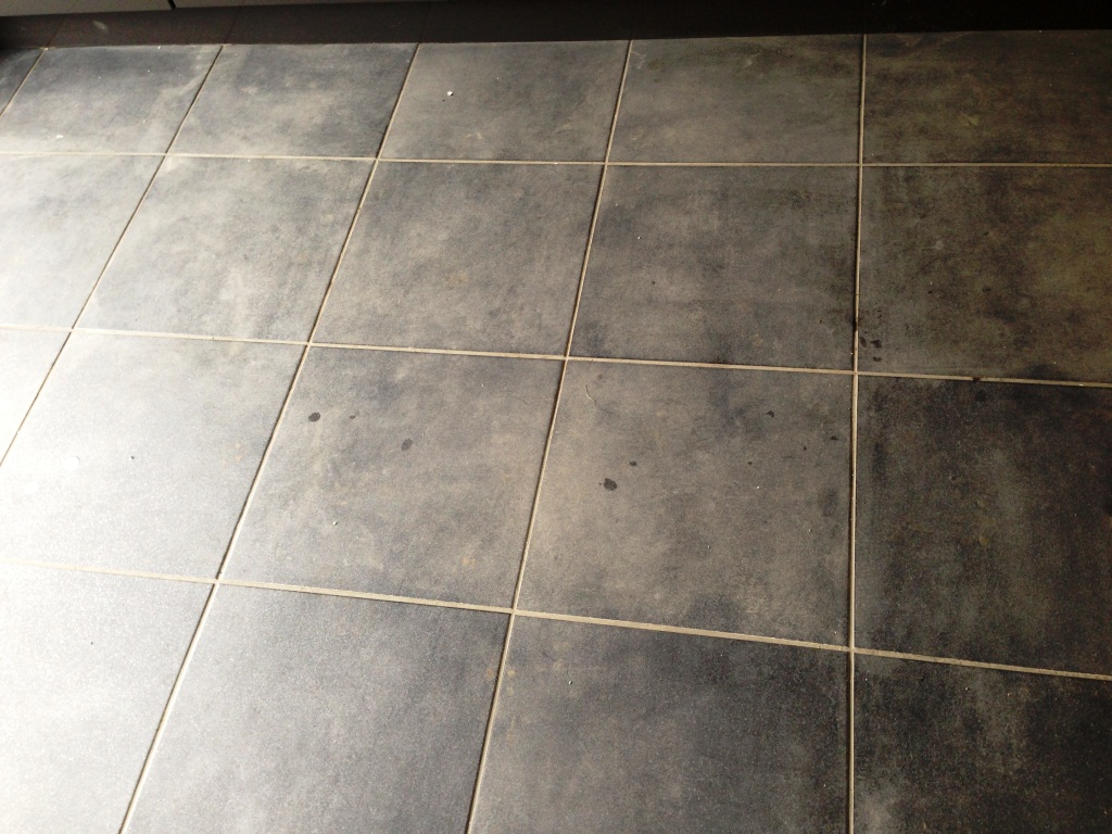 https://north-cumbria.tiledoctor.biz/wp-content/uploads/sites/25/2013/11/Textured-Porcelain-Tile-with-Limestone-Grout-in-Kendal.jpg